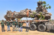 70-year-old Banyan tree uprooted due to heavy rains, replanted in Telangana’s Sircilla